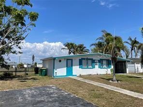 view of front facade with a front yard