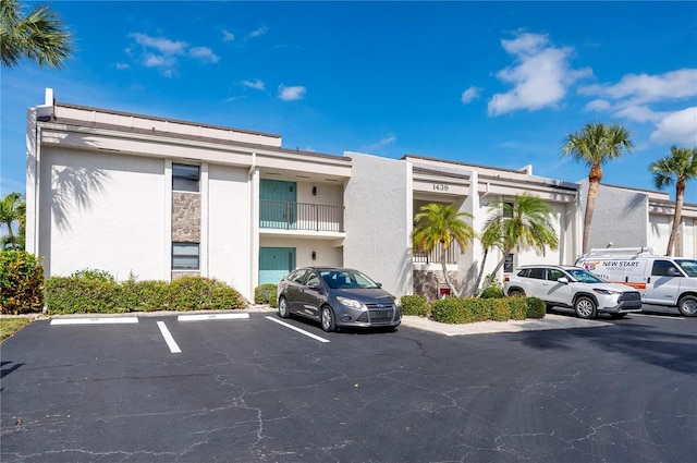 1439 Mediterranean Dr Unit C, Punta Gorda, FL 33950 - view of building exterior featuring uncovered parking