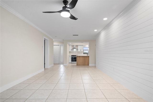 1439 Mediterranean Dr Unit C, Punta Gorda, FL 33950 - unfurnished living room with recessed lighting, light tile patterned floors, ornamental molding, baseboards, and a ceiling fan