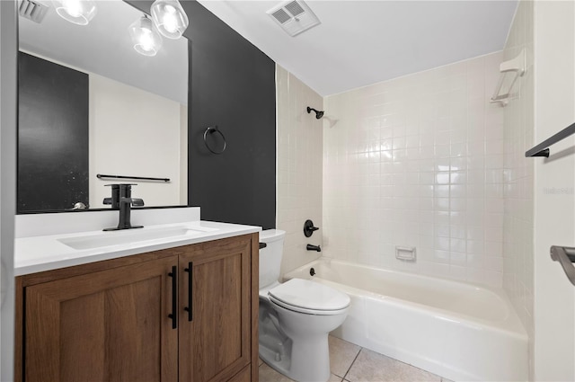 full bathroom featuring vanity, toilet, tile patterned floors, and tiled shower / bath