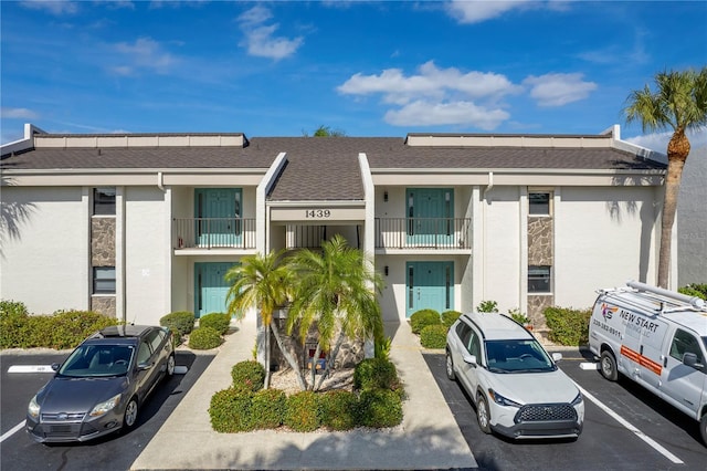 1439 Mediterranean Dr Unit C, Punta Gorda, FL 33950 - view of building exterior featuring uncovered parking