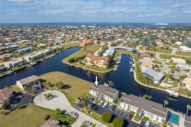 bird's eye view with a water view