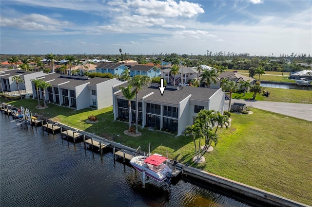 drone / aerial view with a water view