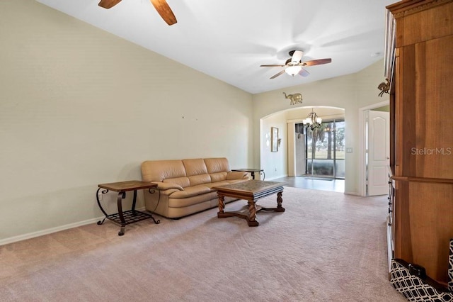 carpeted living room featuring ceiling fan