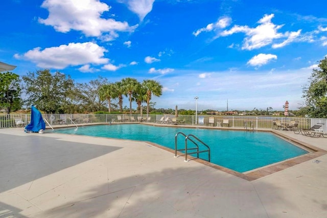 view of pool featuring a patio