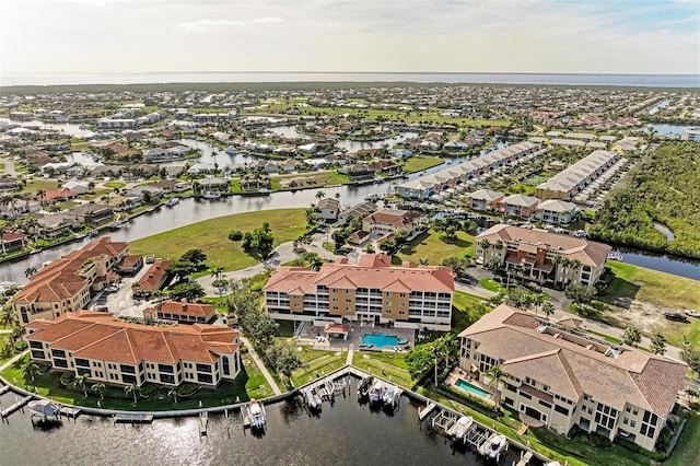 drone / aerial view with a water view