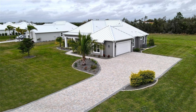 exterior space with a garage and a yard