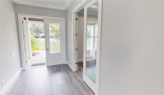 entryway with light hardwood / wood-style flooring