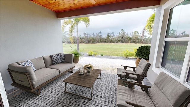 view of patio / terrace with ceiling fan and an outdoor hangout area