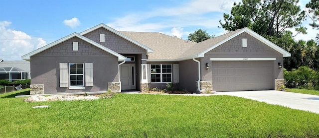 craftsman house with a garage and a front yard