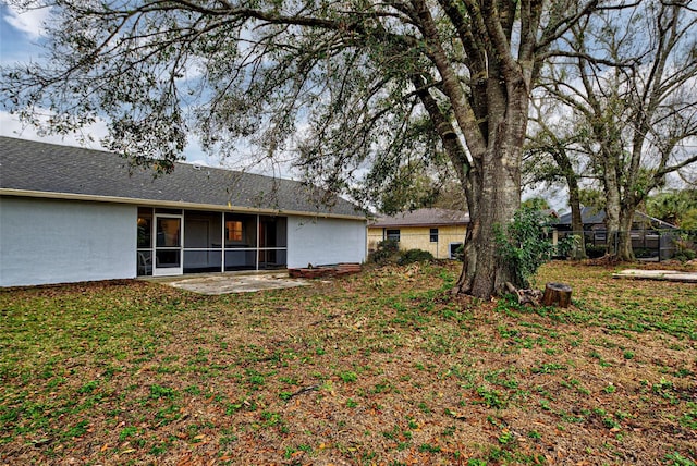 rear view of house with a patio area