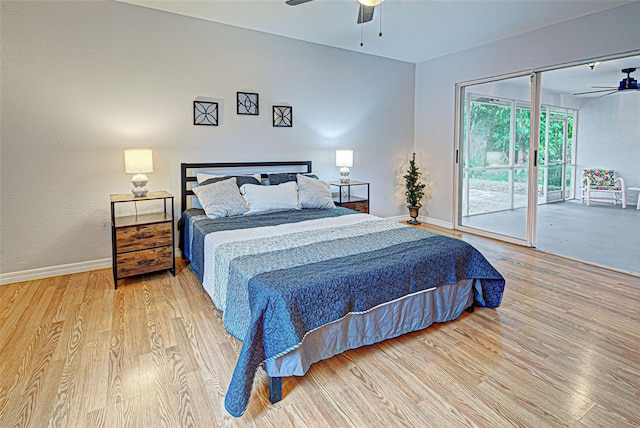 bedroom featuring light hardwood / wood-style floors, ceiling fan, and access to outside