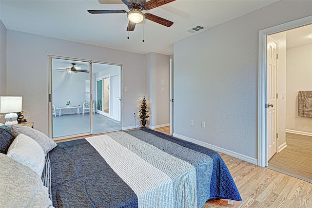 bedroom featuring light hardwood / wood-style floors and ceiling fan