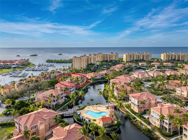 bird's eye view with a water view