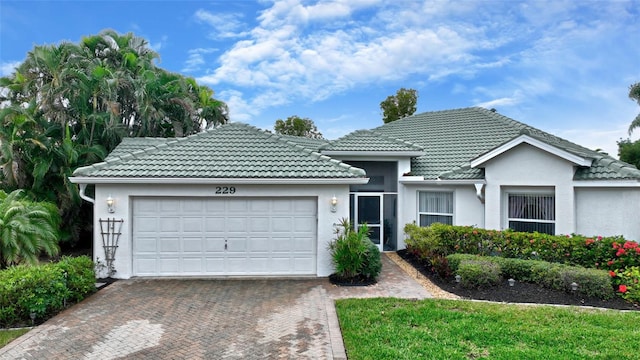 view of front of house with a garage