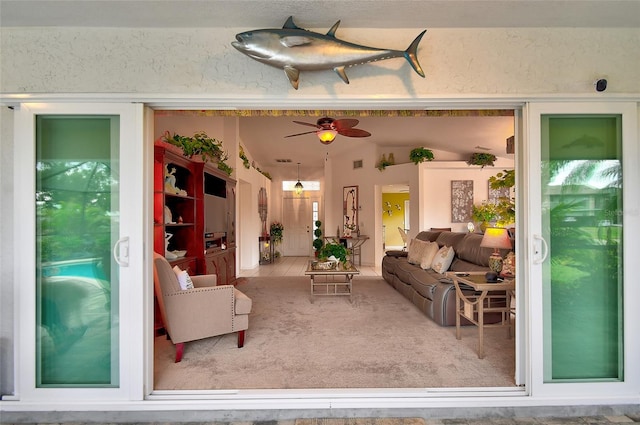 living room with ceiling fan