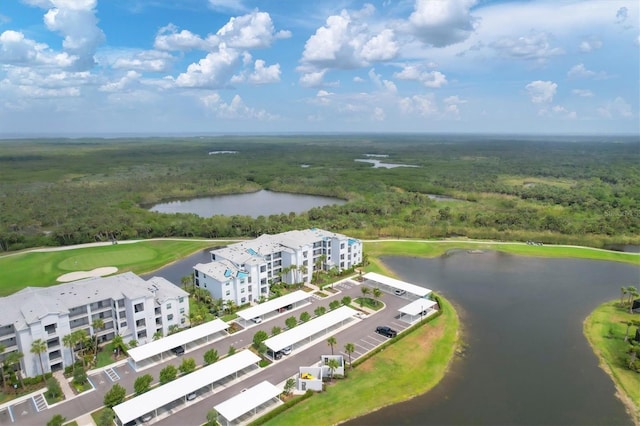 drone / aerial view with a water view