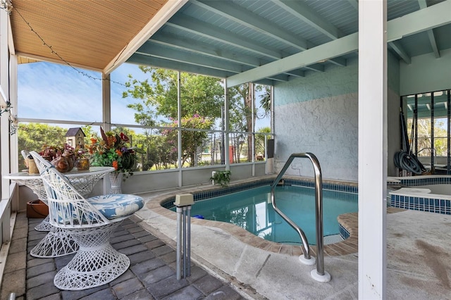 view of pool featuring a patio area