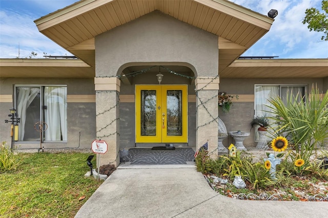 entrance to property featuring french doors