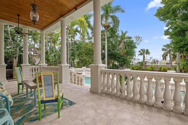 view of patio / terrace featuring ceiling fan