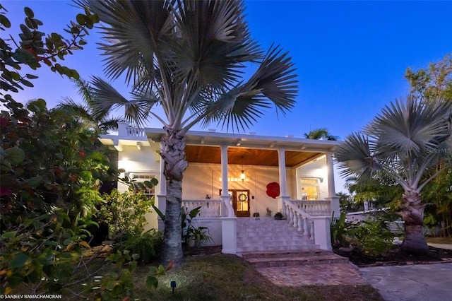 view of front of property featuring covered porch