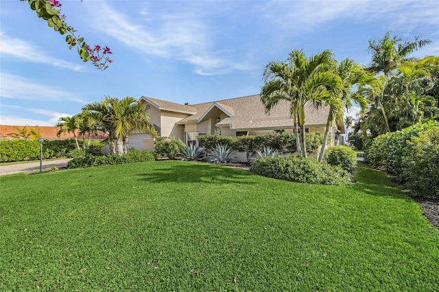 view of front of home with a front yard