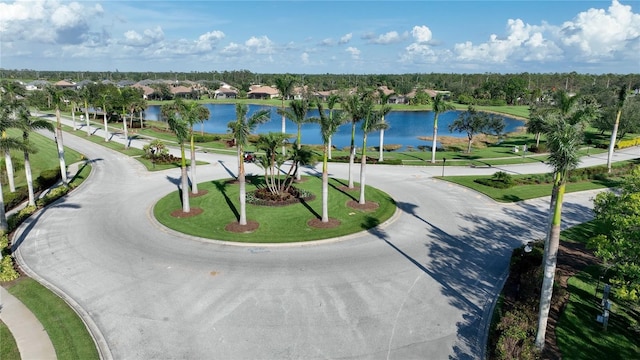 birds eye view of property featuring a water view