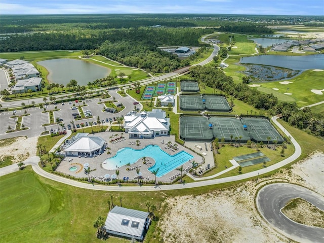 birds eye view of property with a water view