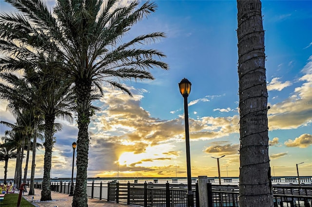 view of home's community with a water view