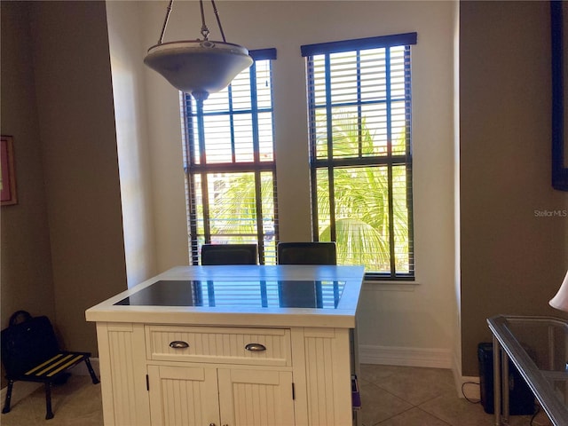 office with light tile patterned floors