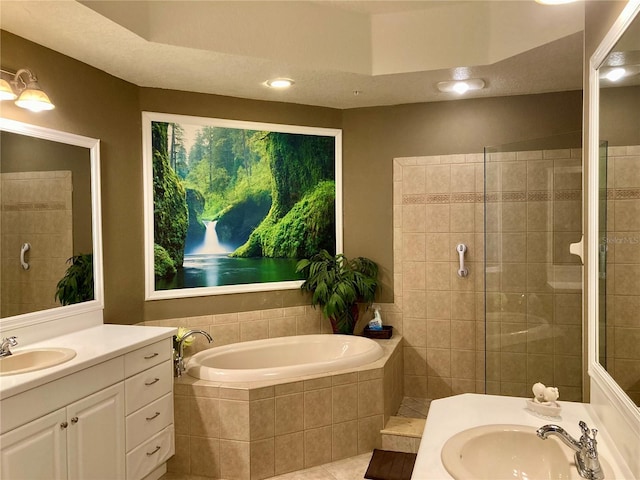 bathroom with vanity, plus walk in shower, and tile patterned floors