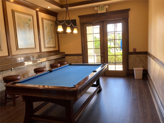 rec room featuring dark hardwood / wood-style floors, crown molding, french doors, and billiards