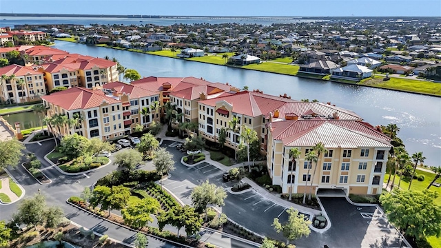 bird's eye view with a water view