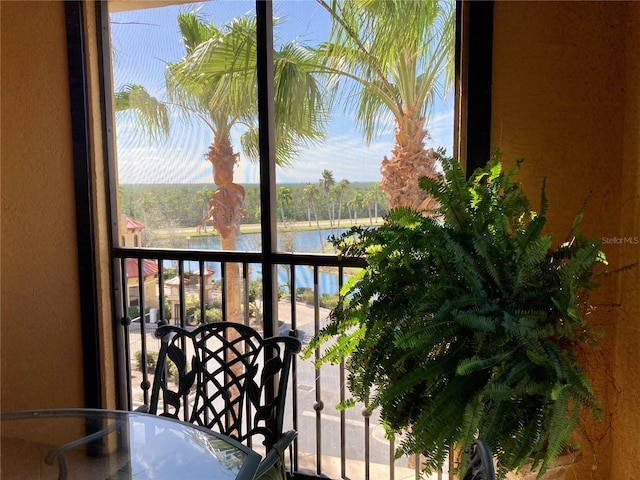 balcony featuring a water view