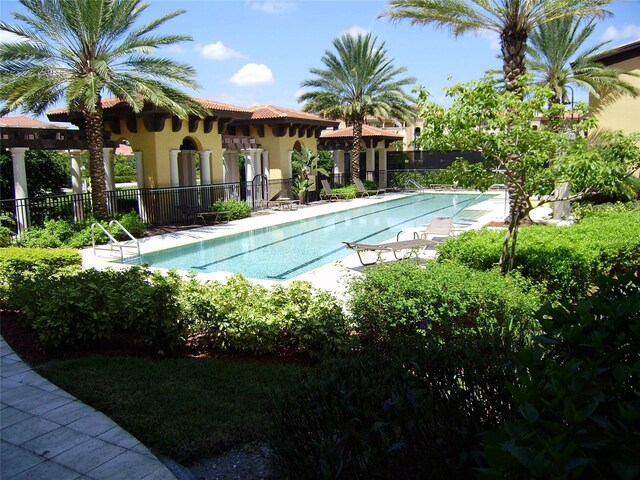 98 Vivante Blvd Unit 98412, Punta Gorda, FL 33950 - pool featuring a patio area and fence