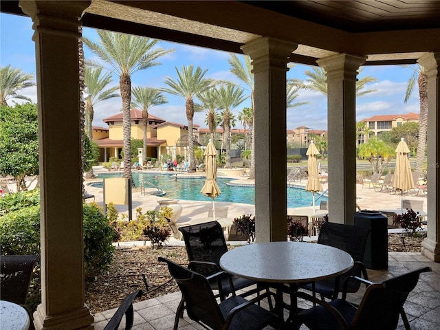 view of patio / terrace featuring a community pool