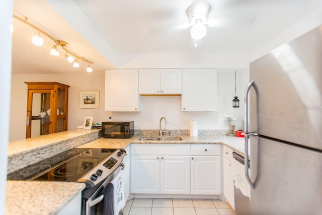 kitchen featuring white cabinetry, ceiling fan, sink, stainless steel appliances, and light tile floors