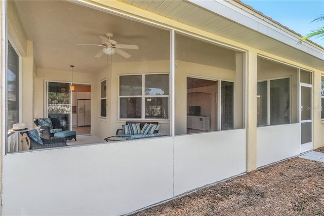 view of patio / terrace featuring ceiling fan