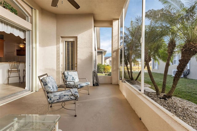 exterior space featuring a patio area and ceiling fan