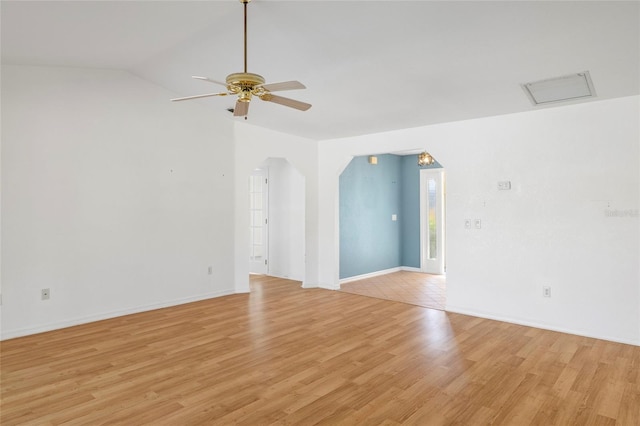 unfurnished room featuring ceiling fan, light tile patterned floors, and lofted ceiling