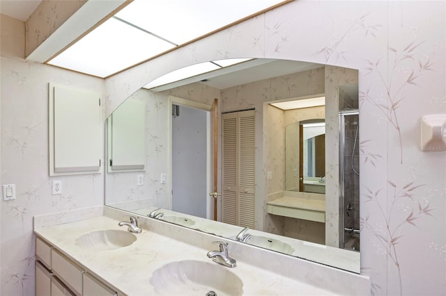 bathroom featuring vanity and walk in shower