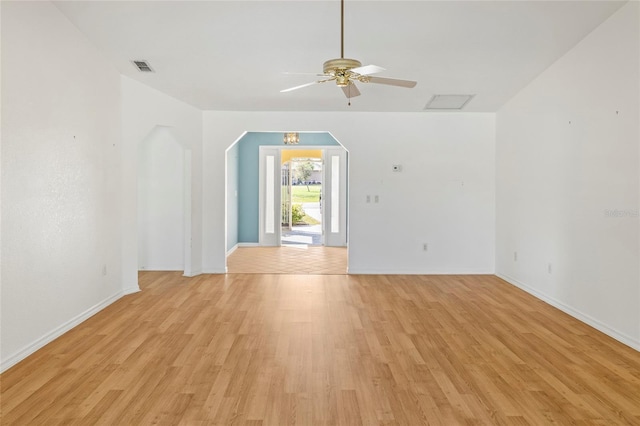 tiled empty room with ceiling fan