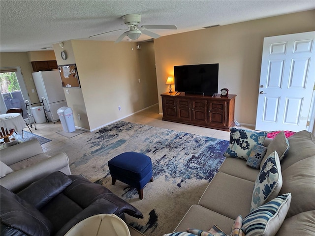 21427 Michigan Ave, Port Charlotte, FL 33952 - living area with ceiling fan and a textured ceiling