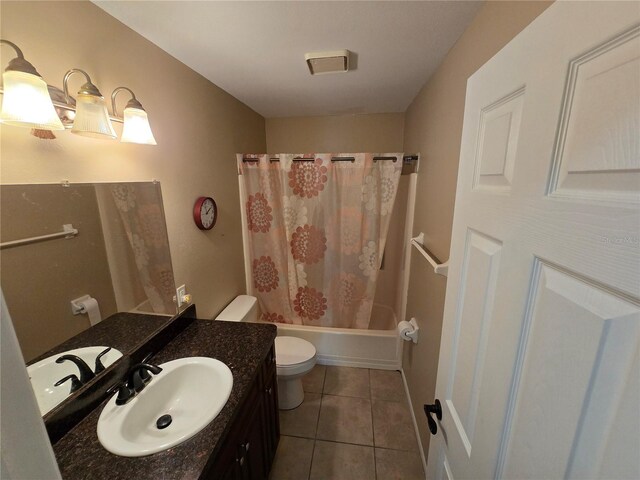 21427 Michigan Ave, Port Charlotte, FL 33952 - bathroom with vanity, tile patterned floors, and shower / bath combo