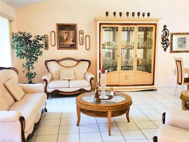 living room with light tile patterned floors