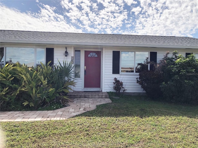 view of front of house with a front yard