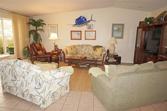 living room with light tile floors and lofted ceiling