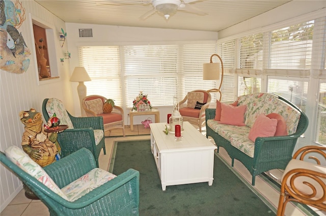 interior space featuring ceiling fan and vaulted ceiling