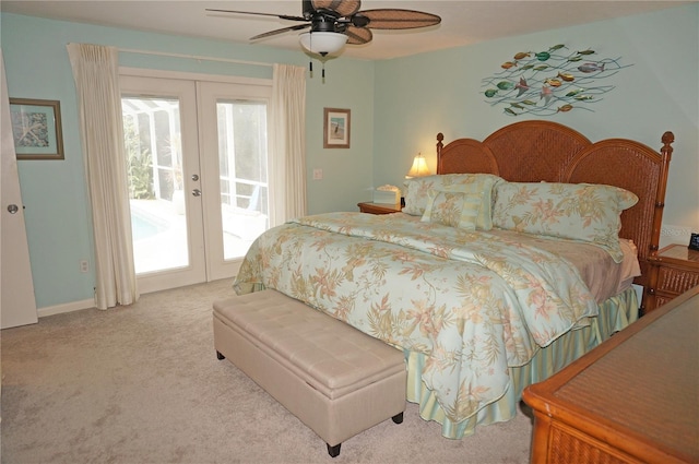 carpeted bedroom featuring access to outside, ceiling fan, and french doors