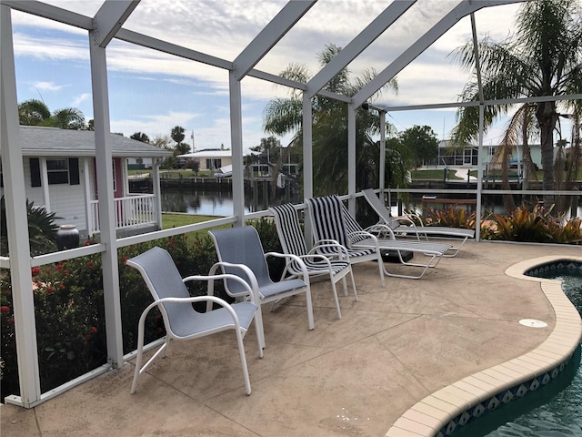 sunroom with a water view